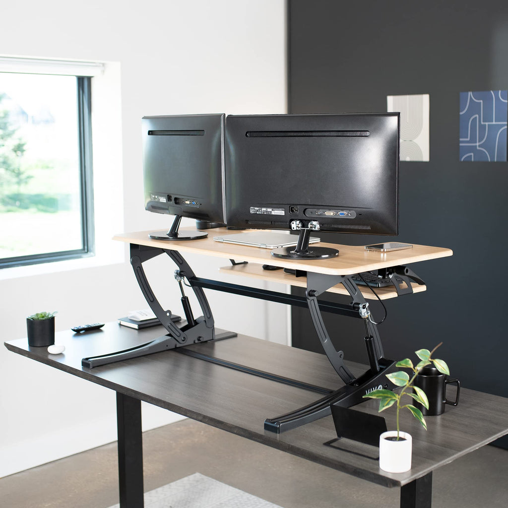 42 inch Height Adjustable Stand Up Desk Converter, V Series, Quick Sit to Stand Tabletop Dual Monitor Riser Workstation, Light Wood Top, Black Frame, DESK-V000VLO